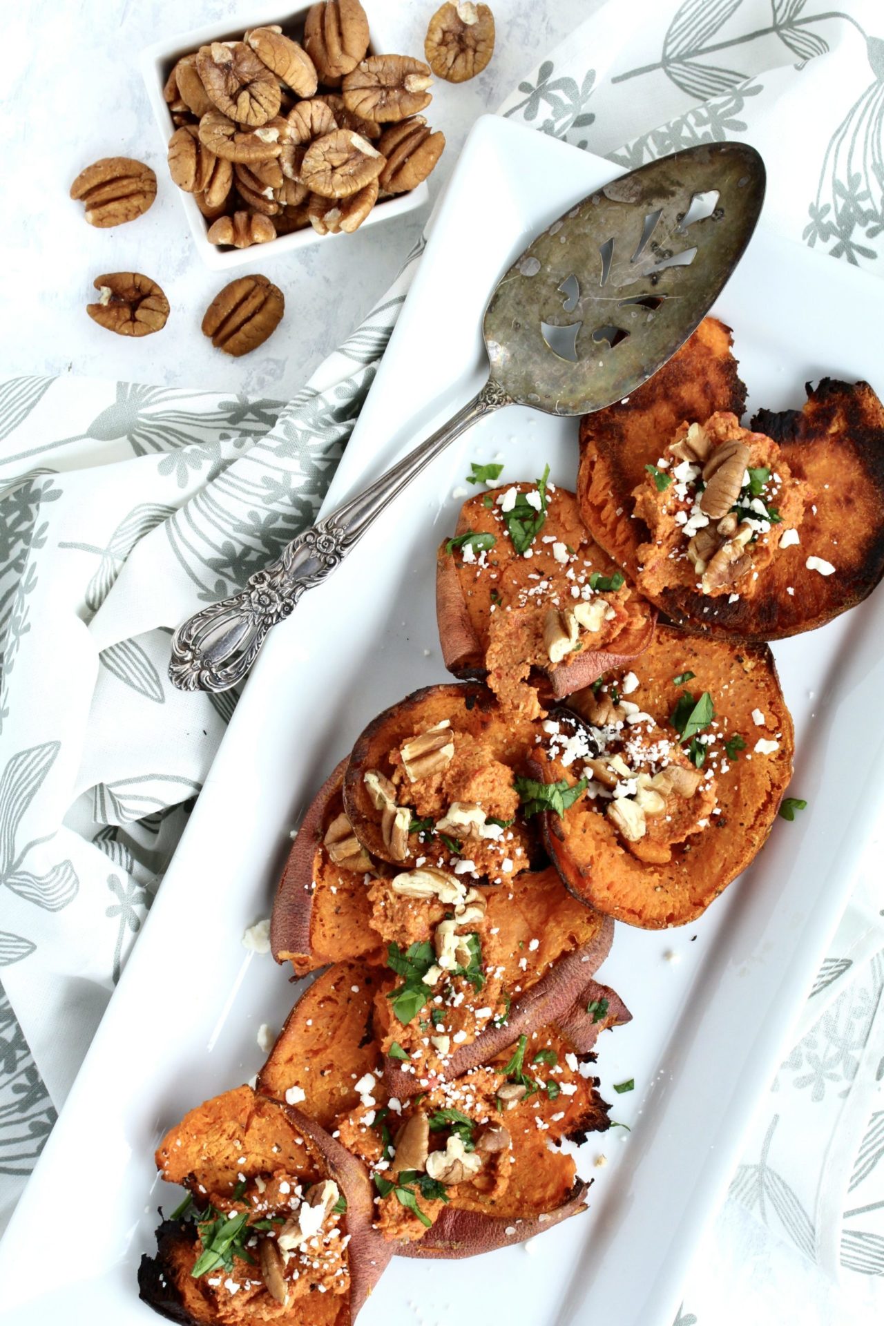 Smashed Roasted Sweet Potatoes with Pecan Red Pepper Sauce